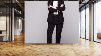 Full body portrait of business woman with crossed arms, isolated on white background Wall mural